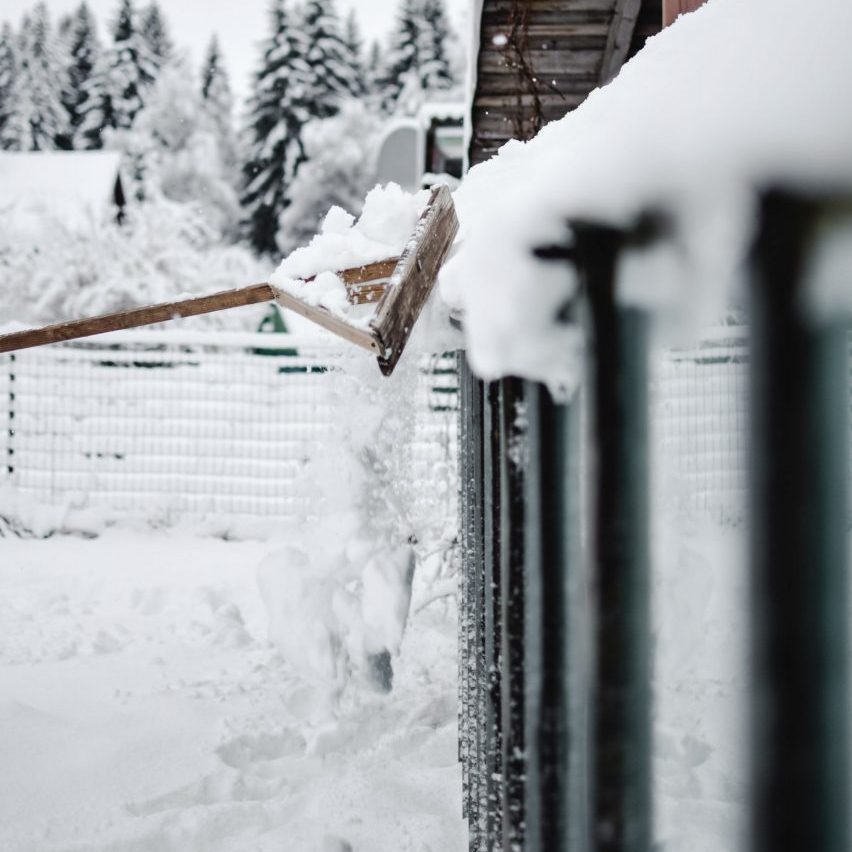 Safely Remove Snow From Your Flat Roof - Energy Shield Roofing